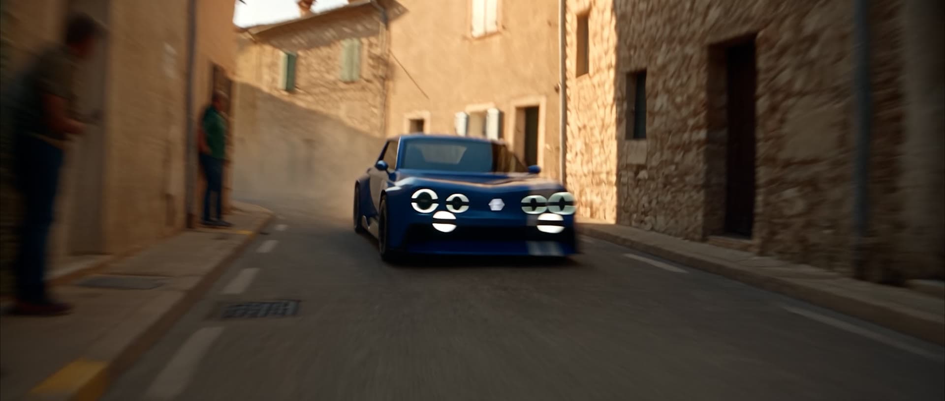 La R8 Gordini traverse une rue de village en pierre